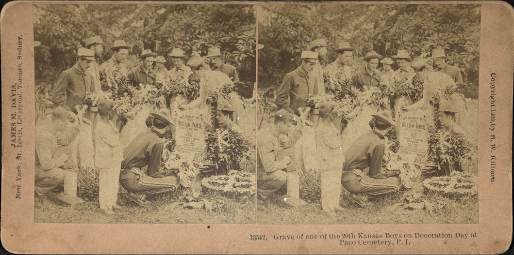 Grave of one of the 20th Kansas Boys on Decoration Day at Paco Cemetery, P. I.